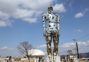 復興を見守る。